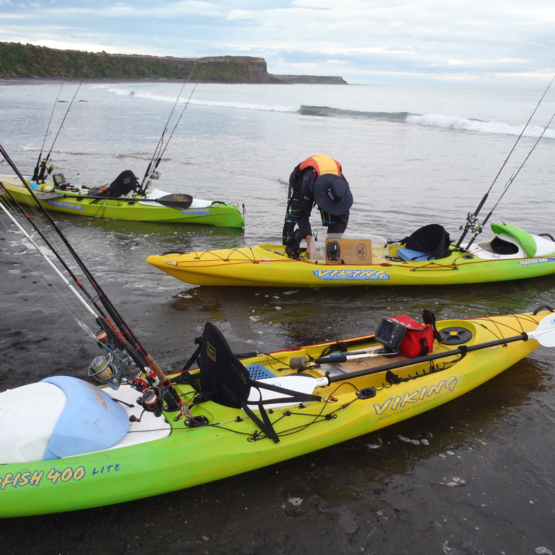 Viking Kayaks about to go fishing at the beach